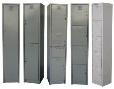 Row of five tall gray metal storage lockers with small ventilation slits at the top and doors secured with locks (locker row).